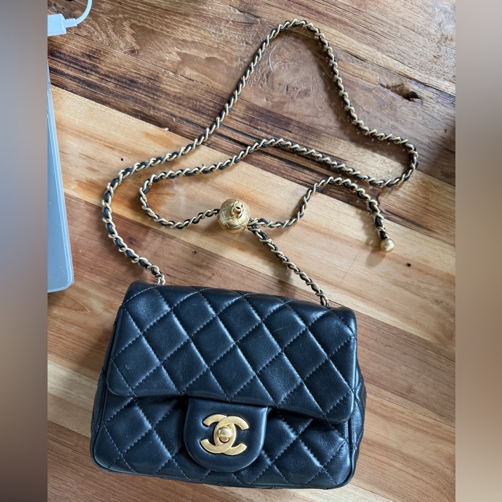 CHANEL Black and Gold Mini Quilted Bag